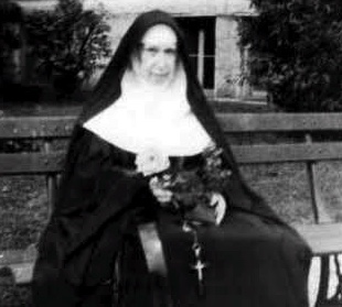 mother Patricia with flower
